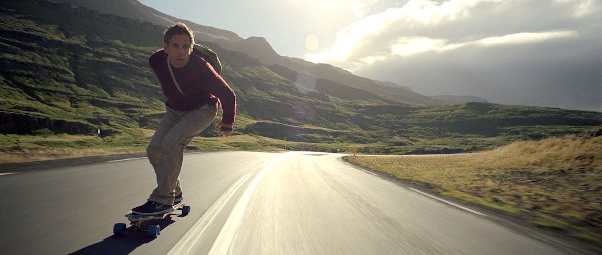 Walter skateboarding through the wide Icelandic landscape