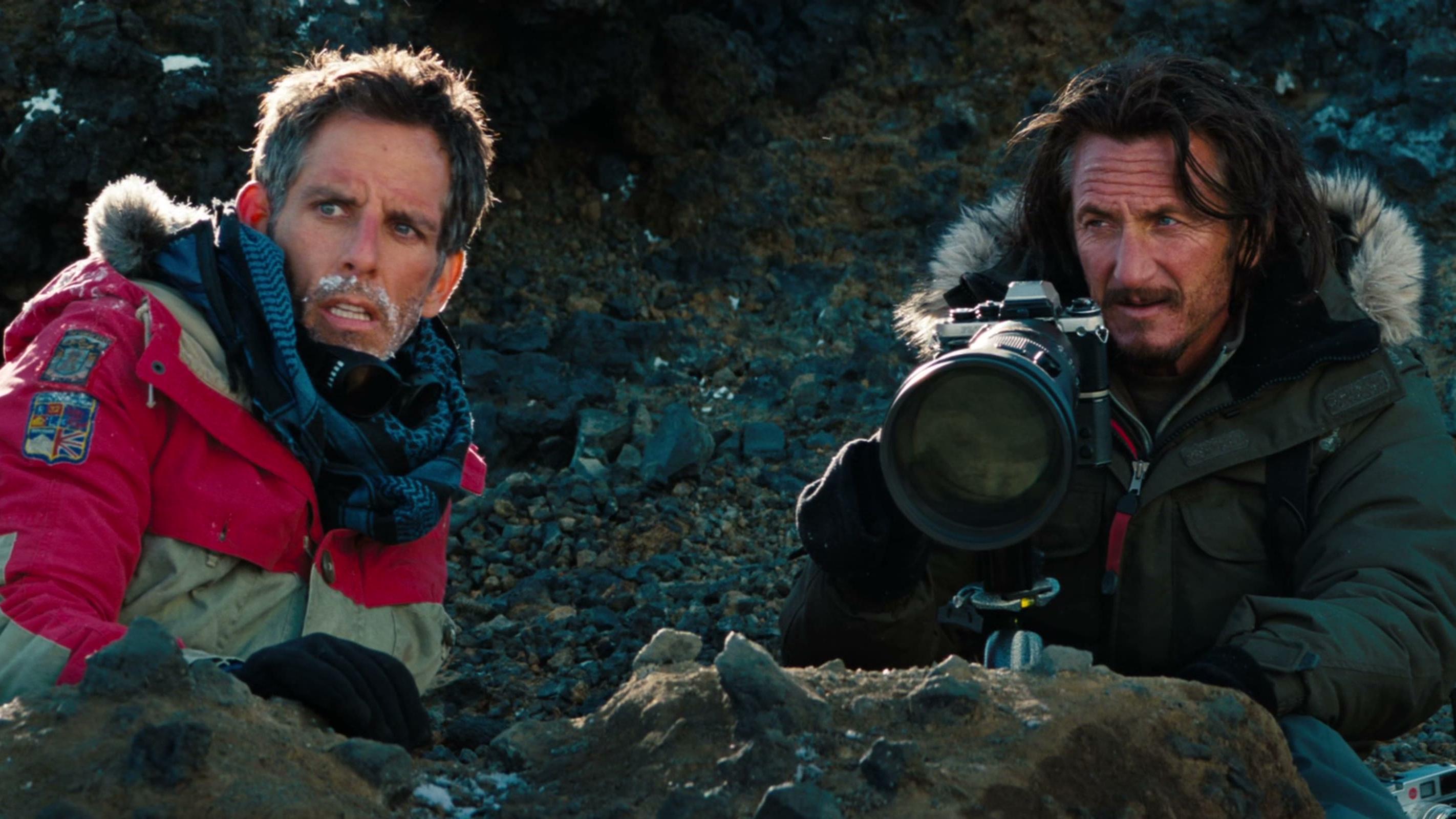Sean O'Connell and Walter waiting quietly for the snow leopard